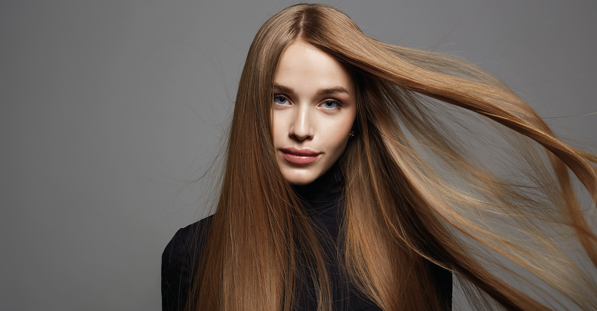 immagine di una ragazza con capelli molto lunghi e lisci